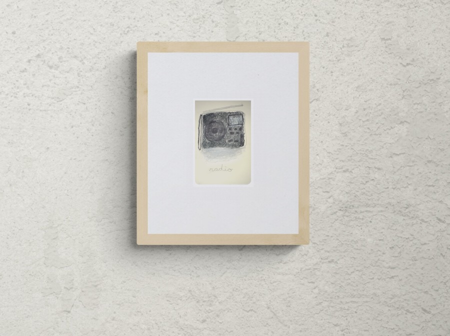 Framed drawing on a wall.